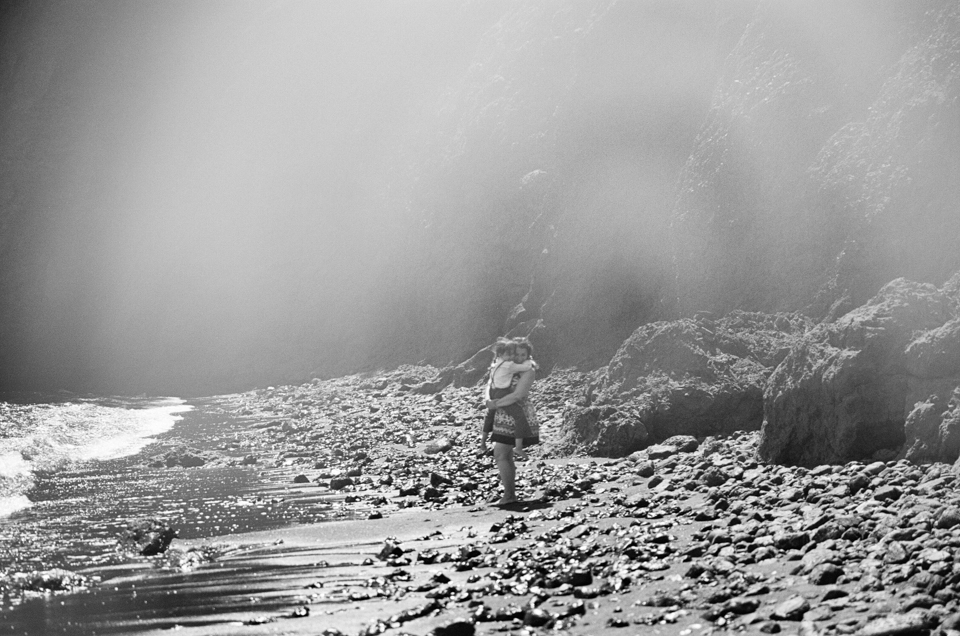 black and white image on beach at kirby cove