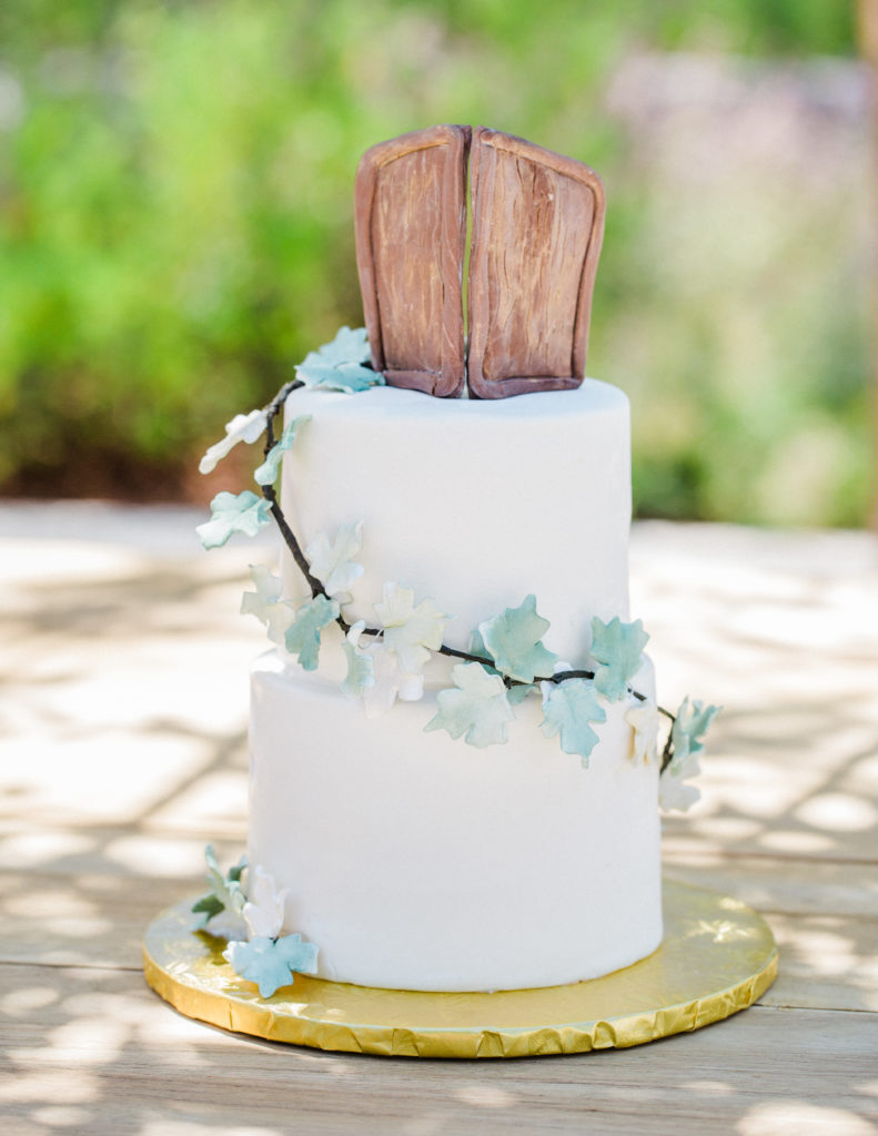 wedding cake with door topper