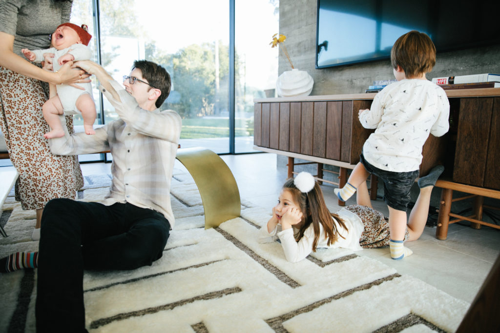 family of five in living room