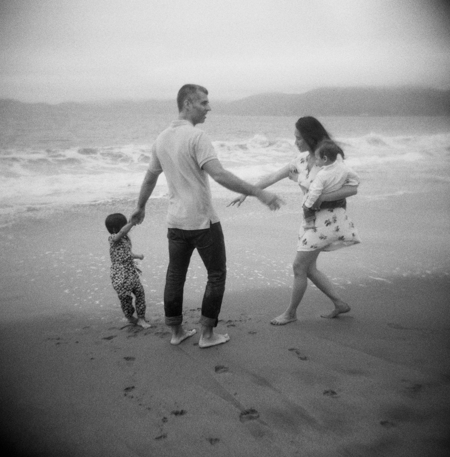 family on beach on baker beach in california