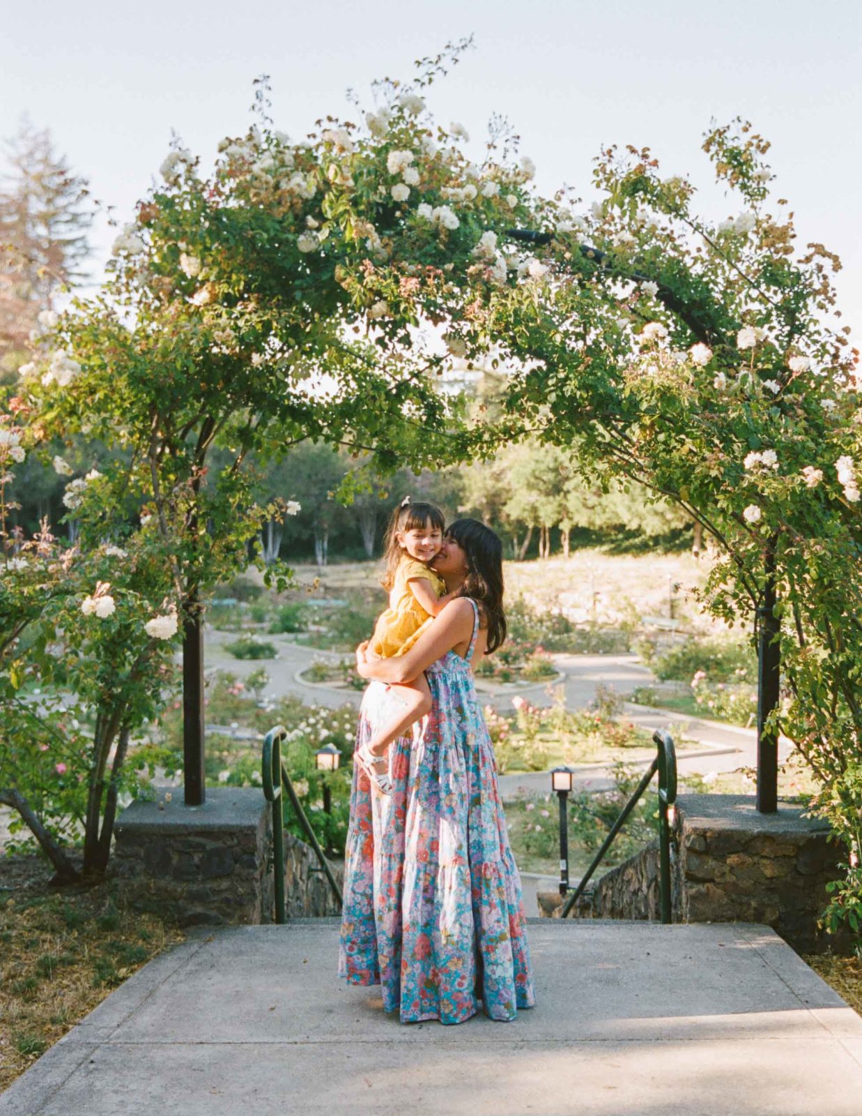 Pregnant mama and toddler daughter at Morcom Rose Garden in Oakland