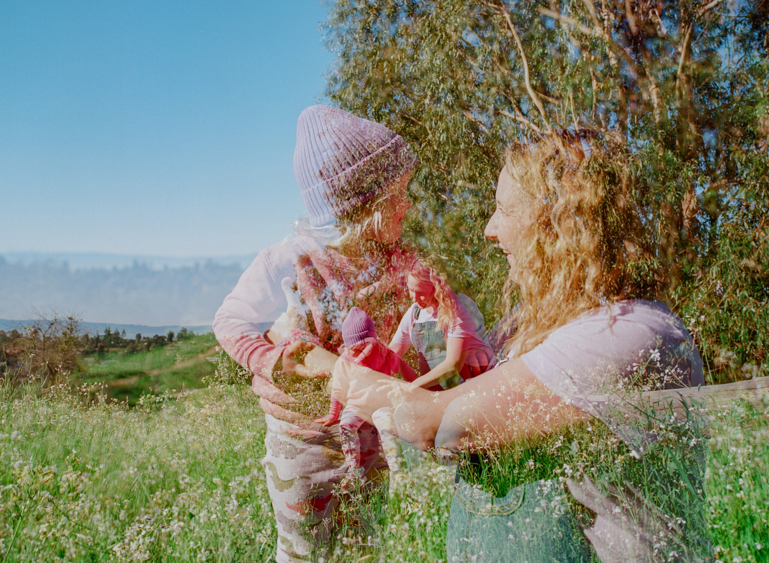 double exposure of pregnant mom with toddler daughter