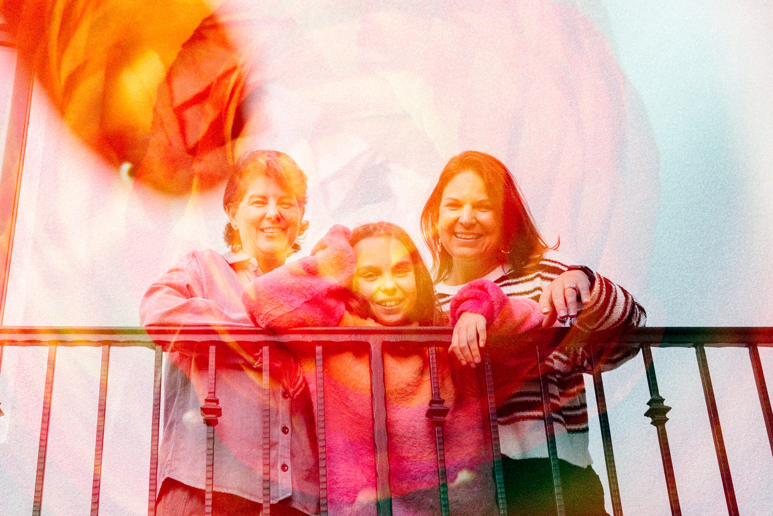 double exposure of flower and family of three